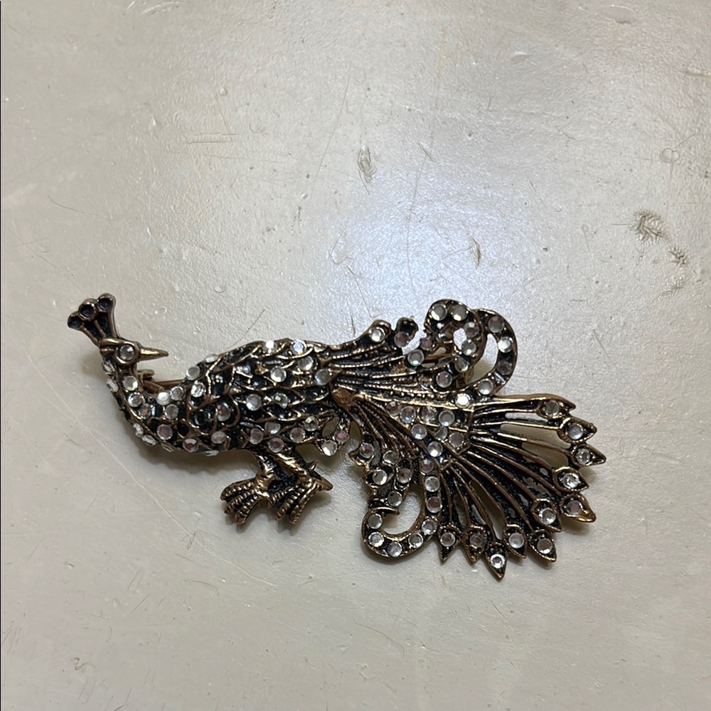 Elegant Gold and rhinestone Peacock Brooch